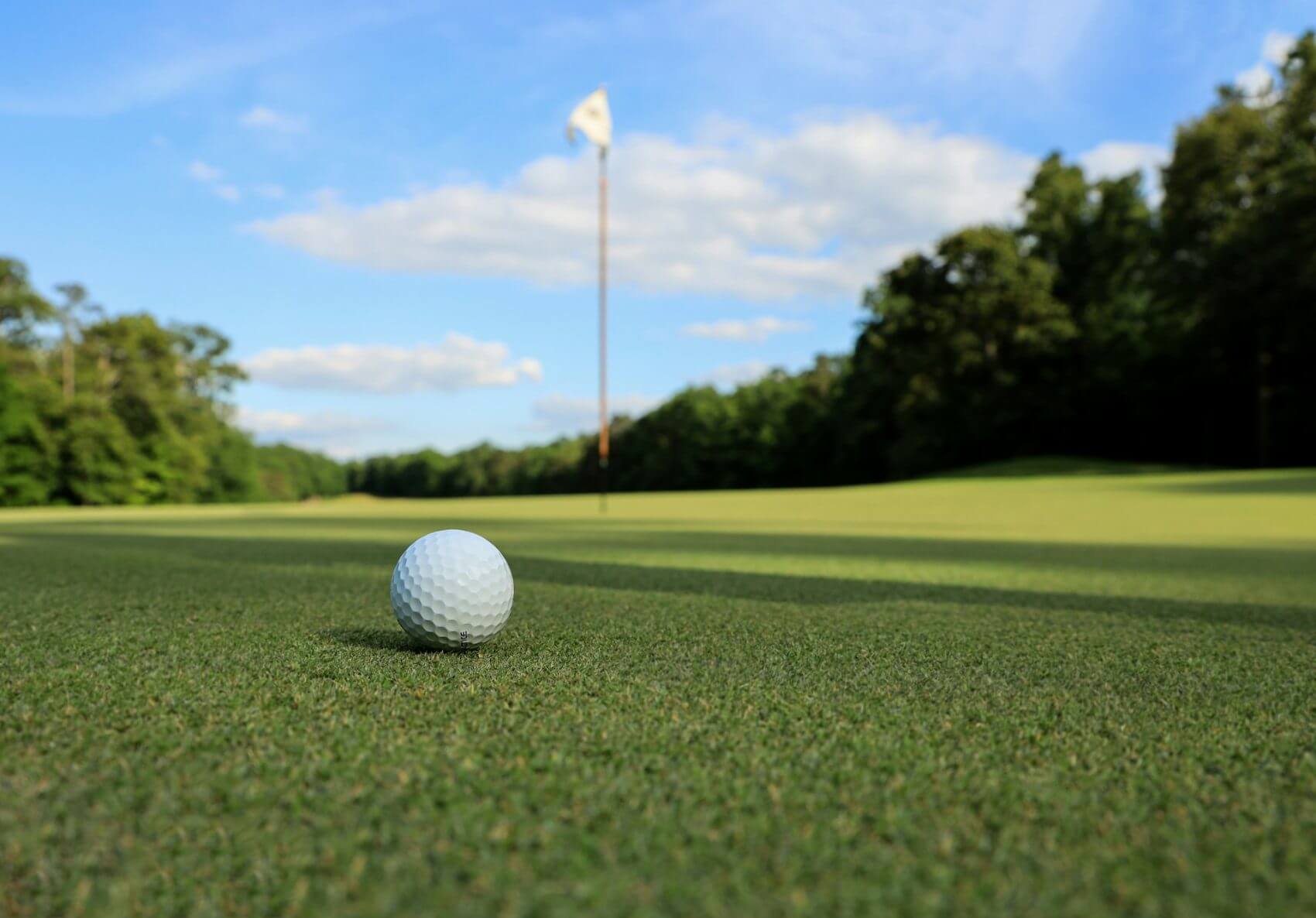 Golf ball and hole